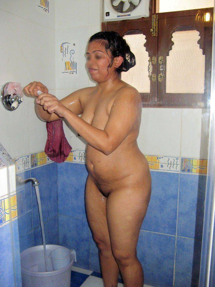 Black wife bathing nude